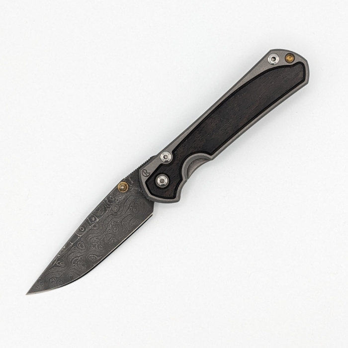 (Scratch & Dent) Chris Reeve Small Sebenza 31 Framelock Knife, Raindrop Damascus, Macassar Ebony